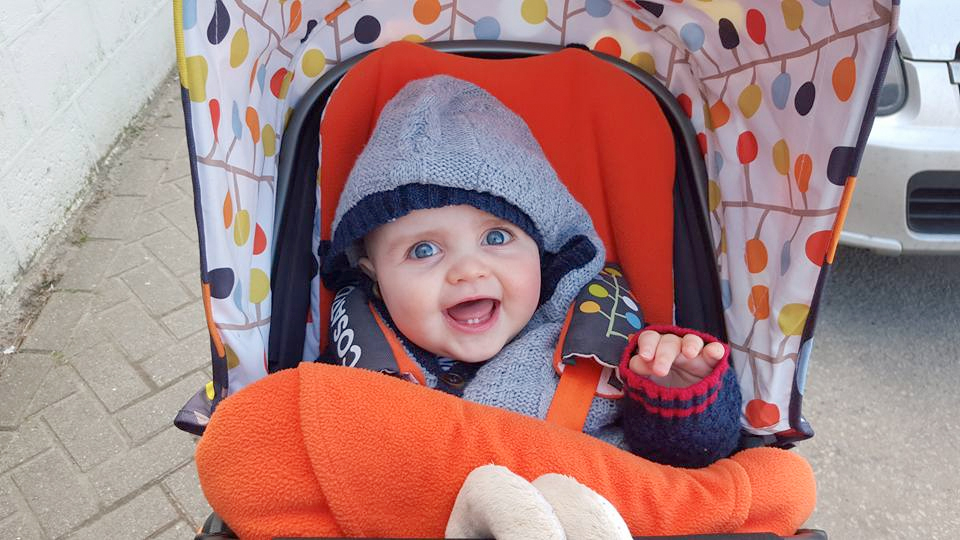 jenson ten months old smiling