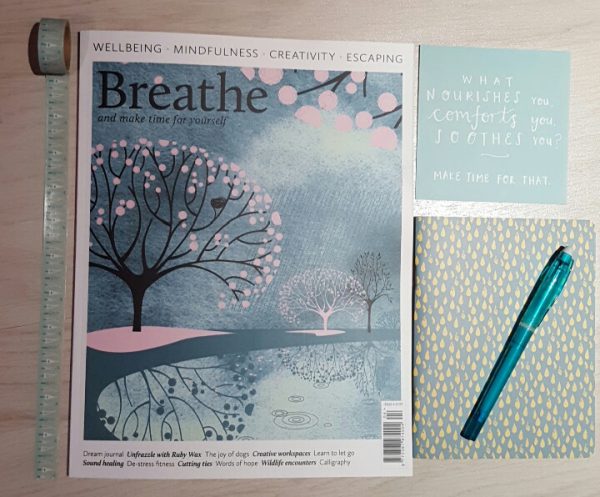 breathe magazine blue flatlay