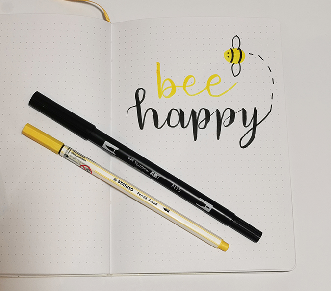 Bee happy brush lettering