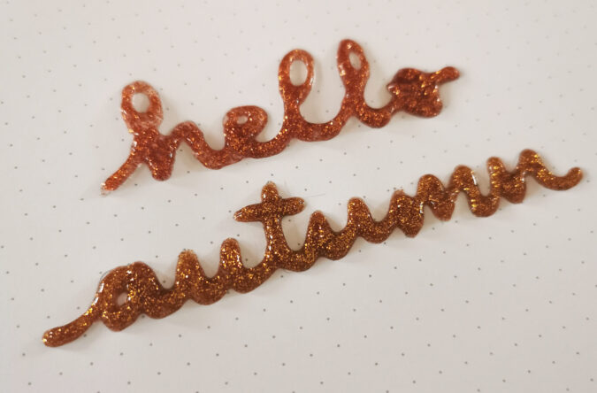 hello autumn written with glitter glue